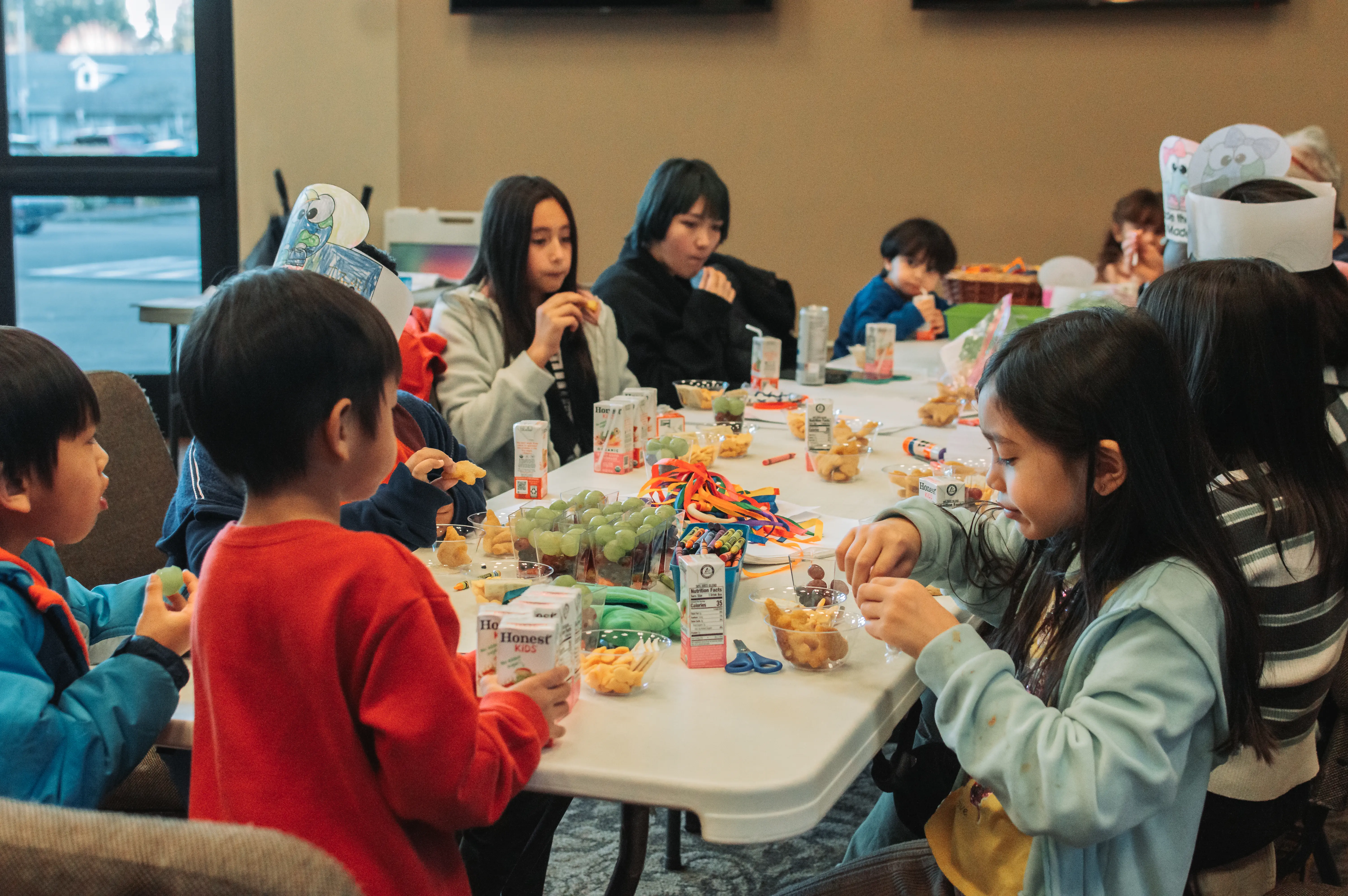 Children laughing and learning in Nations Kids ministry