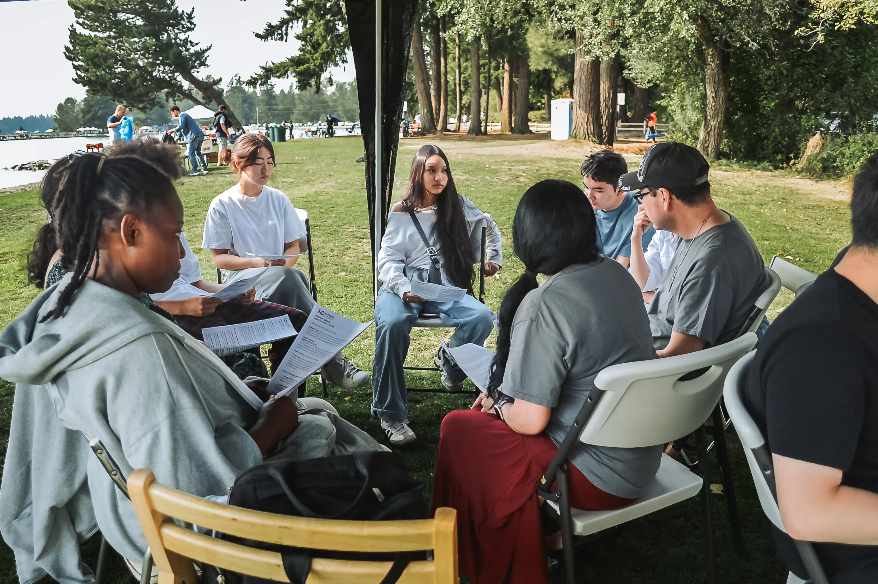 Teenagers in youth group worship and games